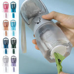 Dog water bottle featuring attached poop bag storage holder