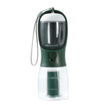 Green and clear portable pet water bottle with a strap on a white background