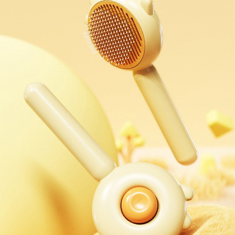 Yellow handheld massager on a yellow background